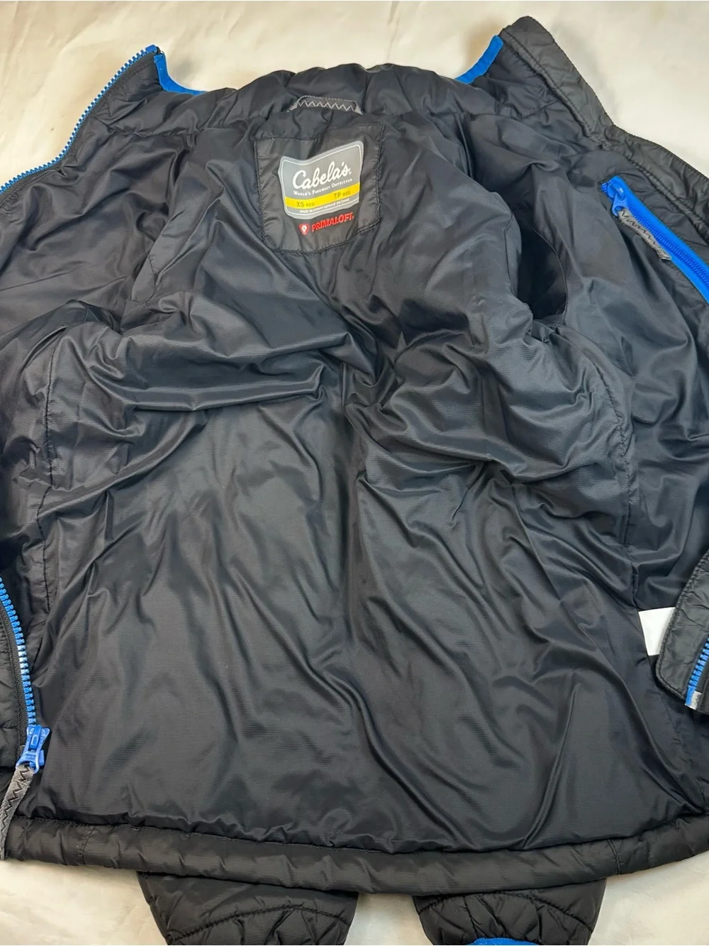 Cabela's Black Kids Puffer Jacket with Bright Blue Trim size XS